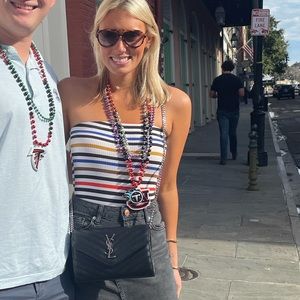 Fun and colorful strapless body suit.